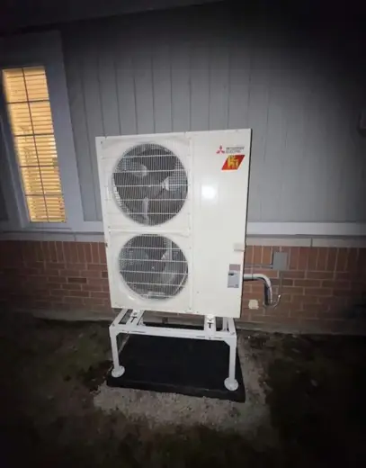 Mitsubishi Hyper-Heat heat pump on a stand