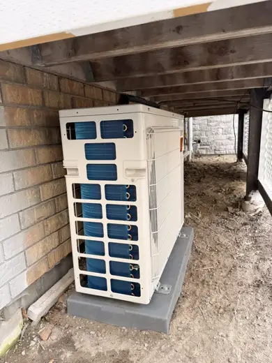 Mitsubishi Hyper-Heat tucked under a deck